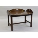 Reproduction mahogany butlers tray coffee table with hinged sides, raised on square moulded supports