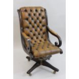 20th Century mahogany tan button leather upholstered open arm office chair, on four shaped
