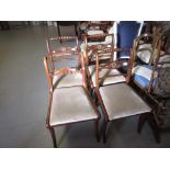 Set of three Regency simulated rosewood and brass mounted rail back dining chairs, together with a