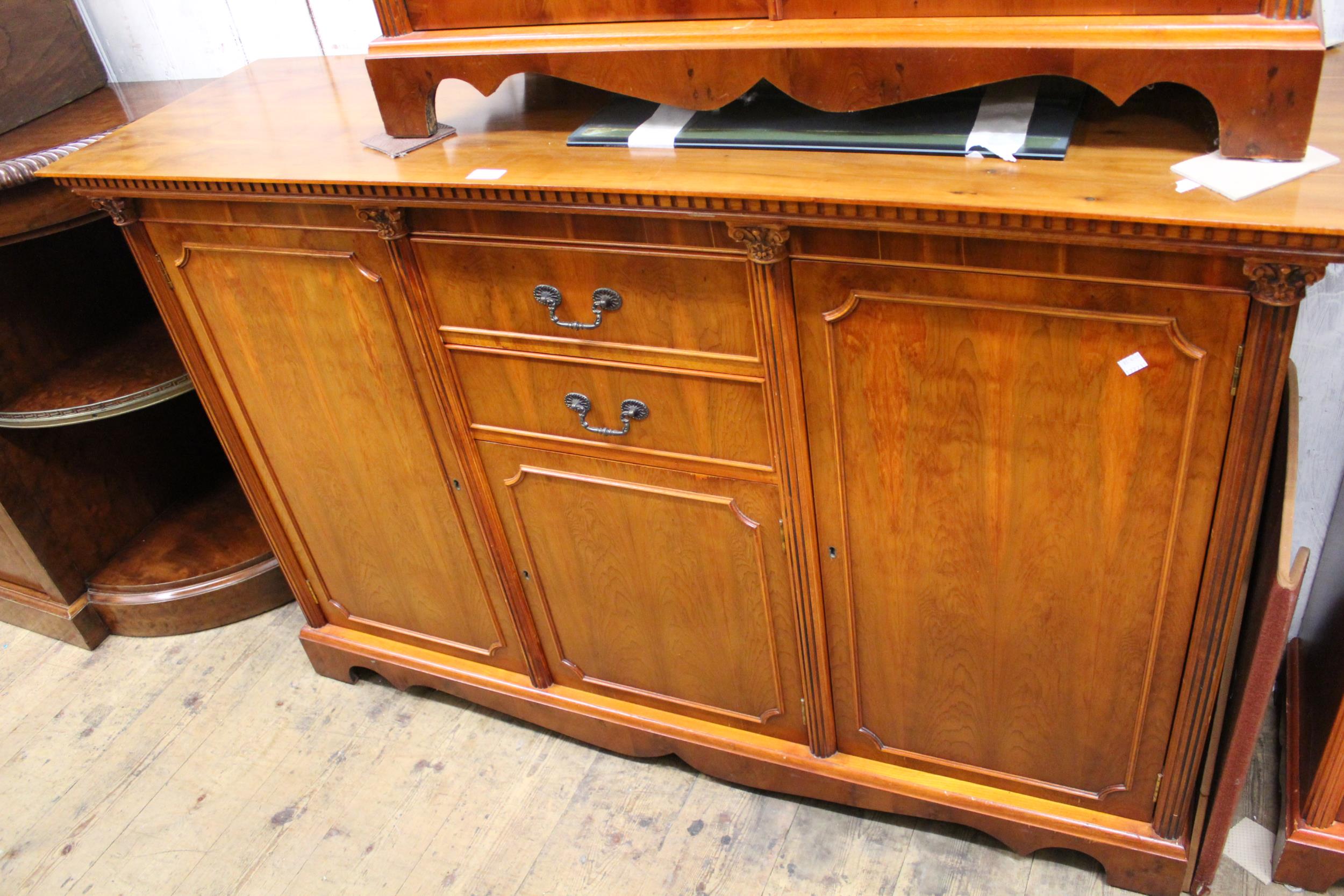 Reproduction yew wood dining room suite comprising: set of eight (six plus two) Regency style dining