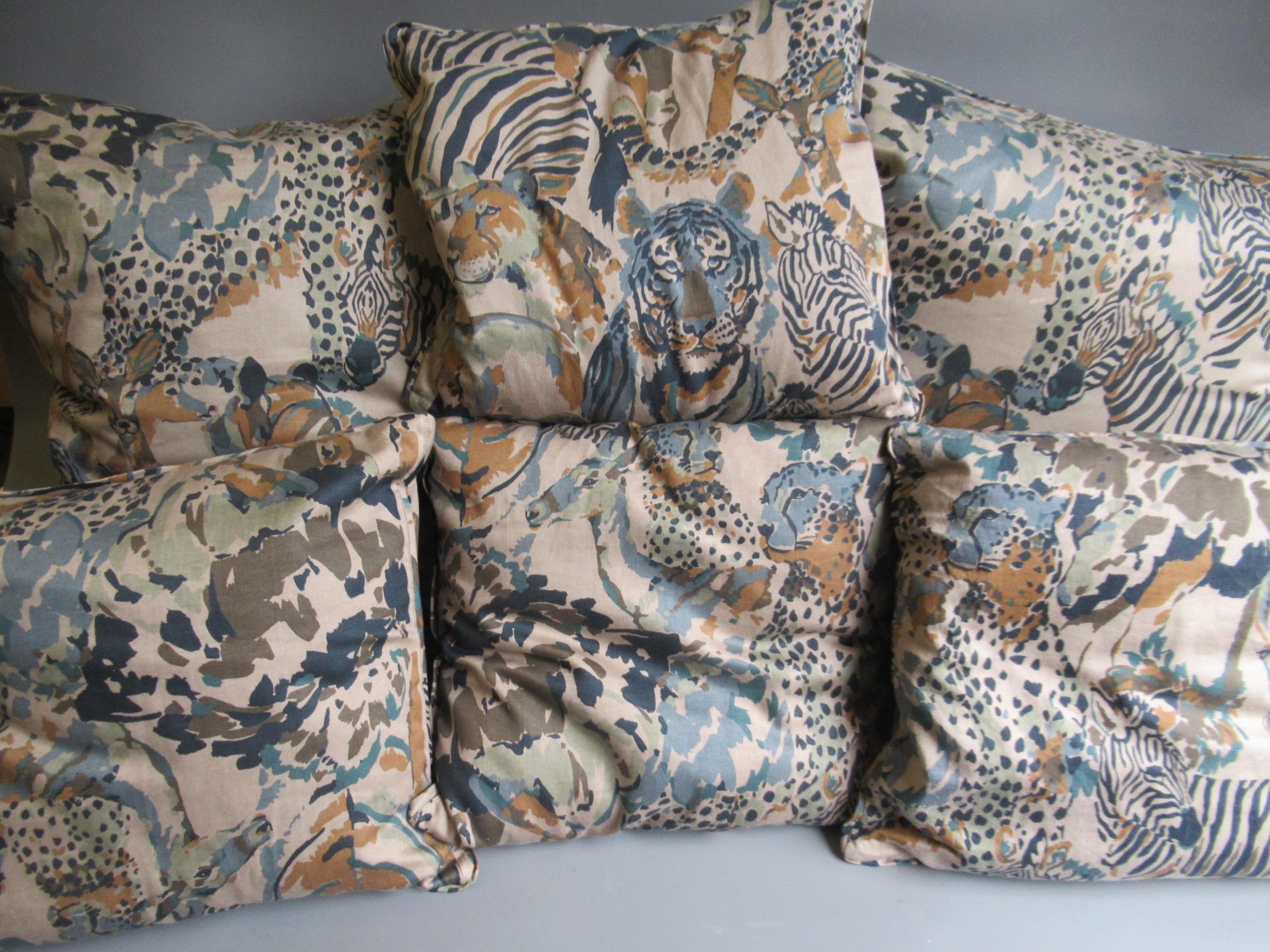 Two Large Animal print cushions, 24ins square and four Interior Fabric Design Inc. 1990 cushions