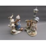 Lladro figure of a girl sweeping leaves beneath a street lamp, 13ins high together with a similar