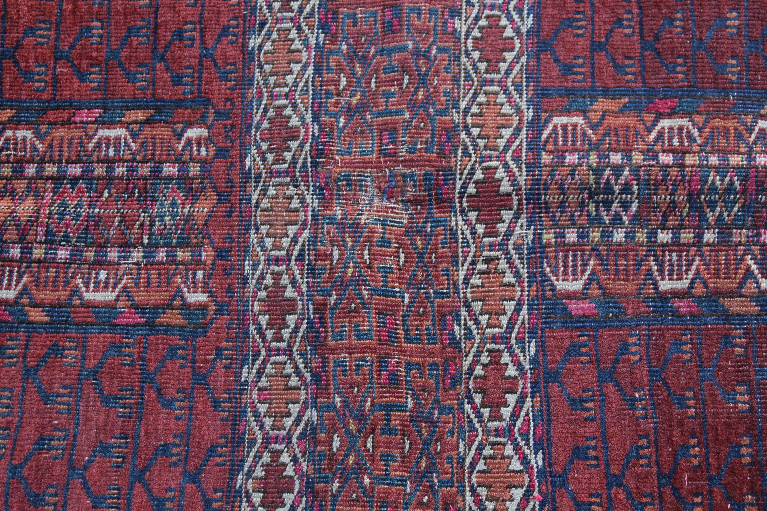 Small Afghan Ersari prayer rug with a wine red ground, 4ft 6ins x 3ft approximately (some wear) - Image 2 of 4