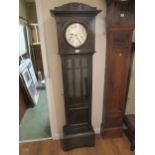 Early 20th Century oak longcase clock with a silvered dial, Arabic numerals and three train