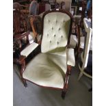 Victorian mahogany spoon back, button upholstered open armchair, raised on turned reeded supports
