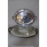 Good quality oval plated two handled tray with engraved centre panel and pierced border, 24ins wide,