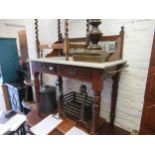 Late Victorian walnut washstand with a tile inset back above marble top and two drawers on turned