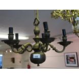Small Dutch style brass five light electrolier, wrought iron and brass three light candelabra and