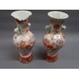 Pair of early 20th Century Japanese two handled pedestal vases painted with birds in landscape (at