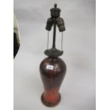 Mid 20th Century Continental pottery baluster form table lamp with patinated metal two branch