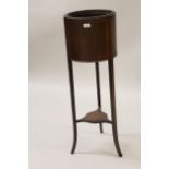 Edwardian mahogany and chequer line inlaid cylindrical jardiniere stand on three shaped supports