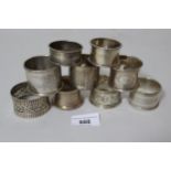 Collection of nine various silver napkin rings, 8oz Silver napkin rings are all silver