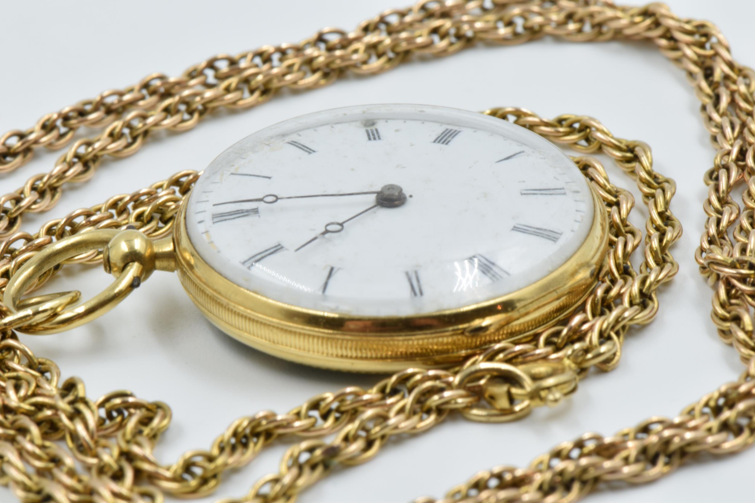 19th Century French gold fob watch, the enamel decorated back set with rose cut diamonds,