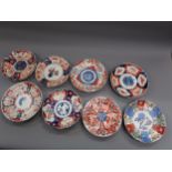 Eight various 19th Century Imari dishes and plates, the largest 8ins diameter