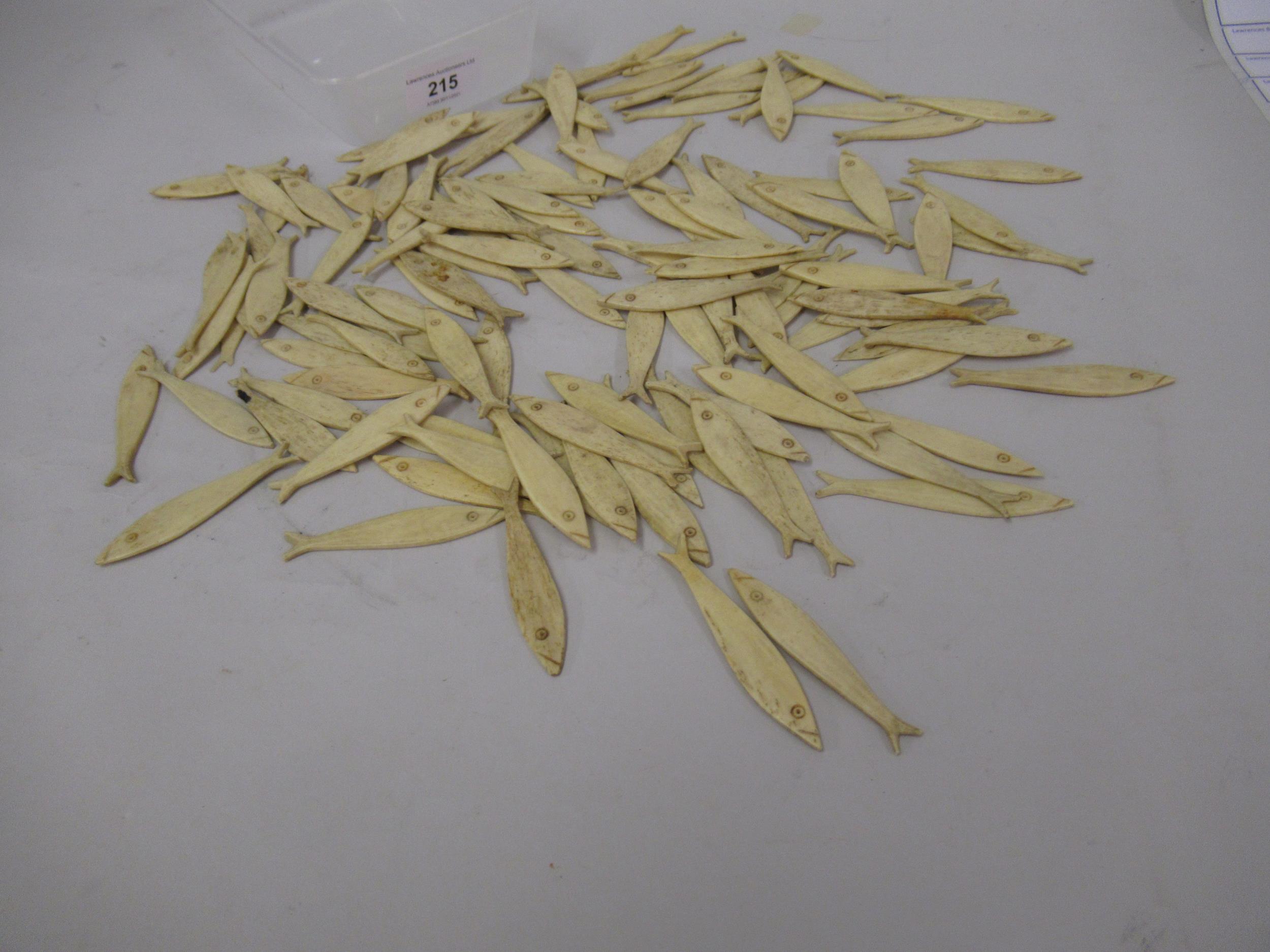 Quantity of 19th Century bone fish shaped gaming counters