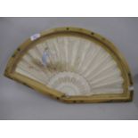 Bone and satin fan painted with a lady, housed in a lacquered fan shaped box