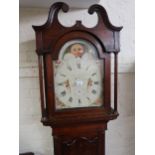 19th Century oak longcase clock, the arched hood with swan neck pediment above a shaped panel door