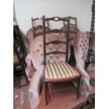 Pair of early 20th Century mahogany ladderback low seat chairs