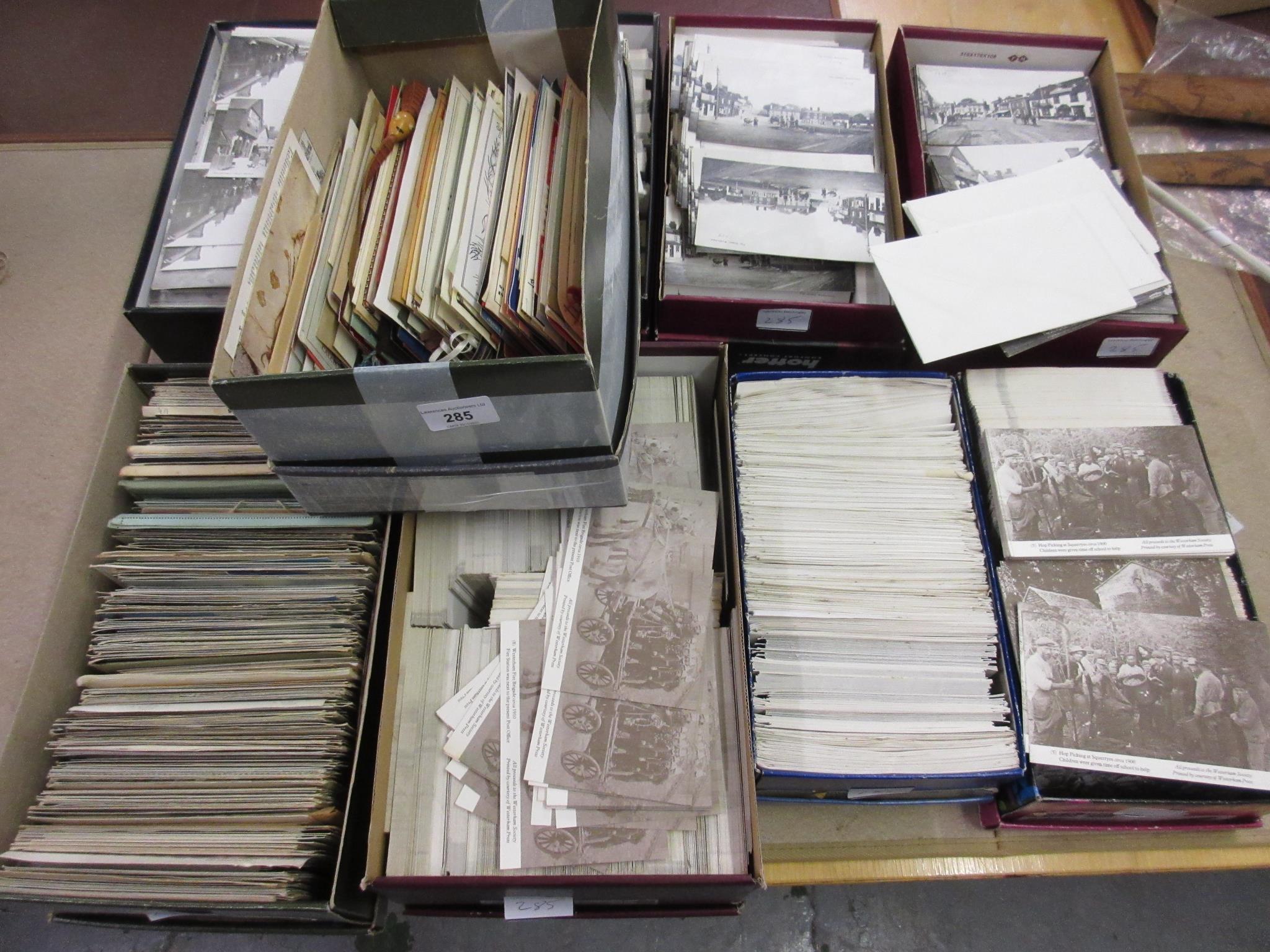 Seven boxes containing a collection of Westerham related reproduction postcards, a box of other