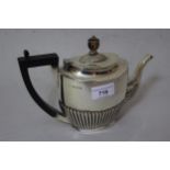 Oval Birmingham silver bachelor teapot of half fluted design, 11.5 troy ounces