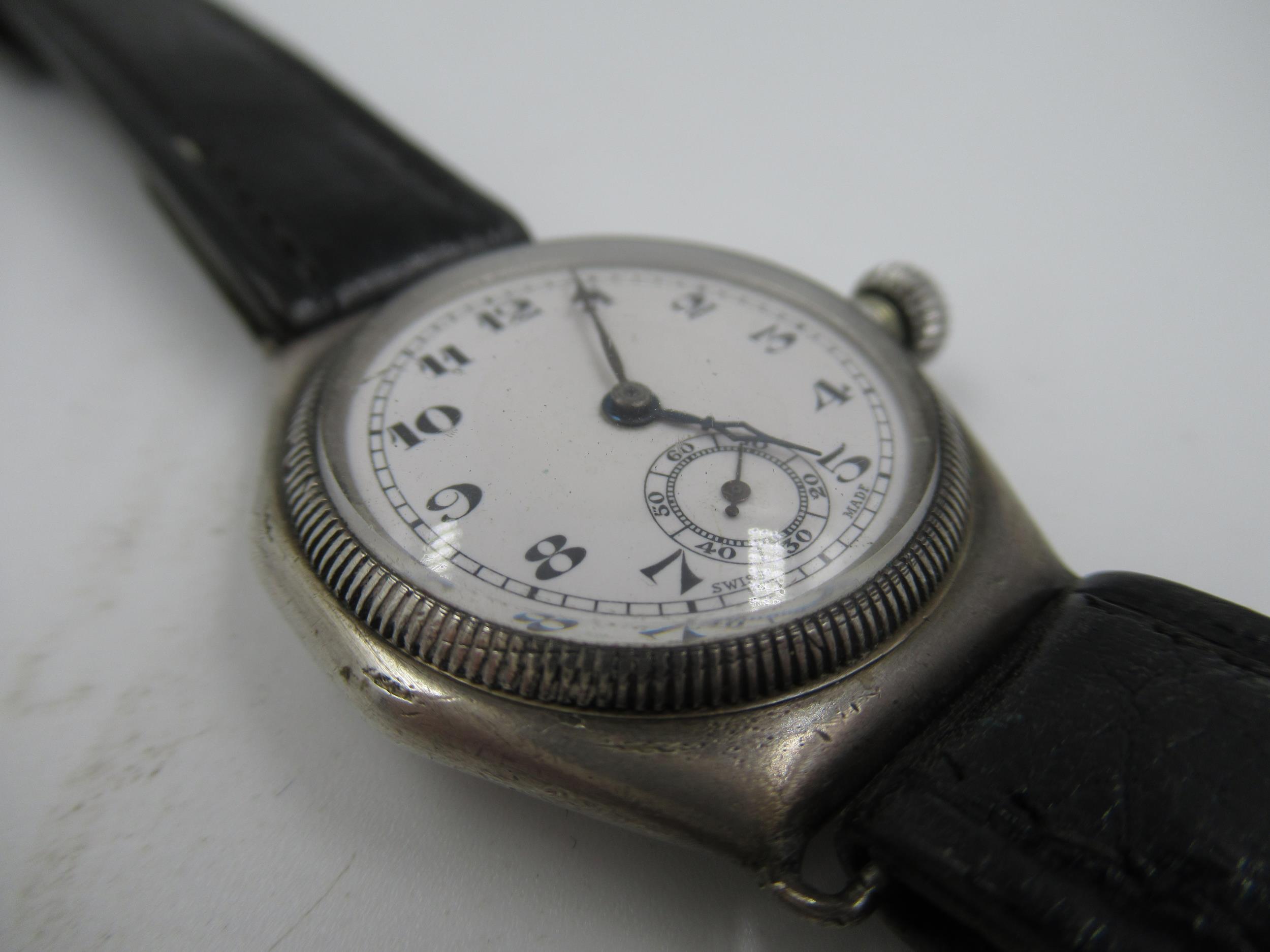 Gentleman's 1920's Rolex silver cased wristwatch, the enamel dial with Arabic numerals and