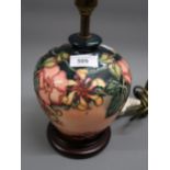 Modern Moorcroft oviform table lamp decorated in the Honeysuckle pattern, 6.75ins high excluding the