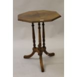 Victorian figured walnut octagonal pedestal occasional table on a tripod base, together with a