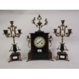 19th Century French black slate and rouge marble two train mantel clock with gilt brass mounts,