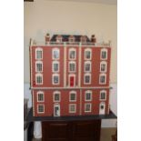 Large modern Georgian style dolls house with twenty rooms flanking a central stairwell,