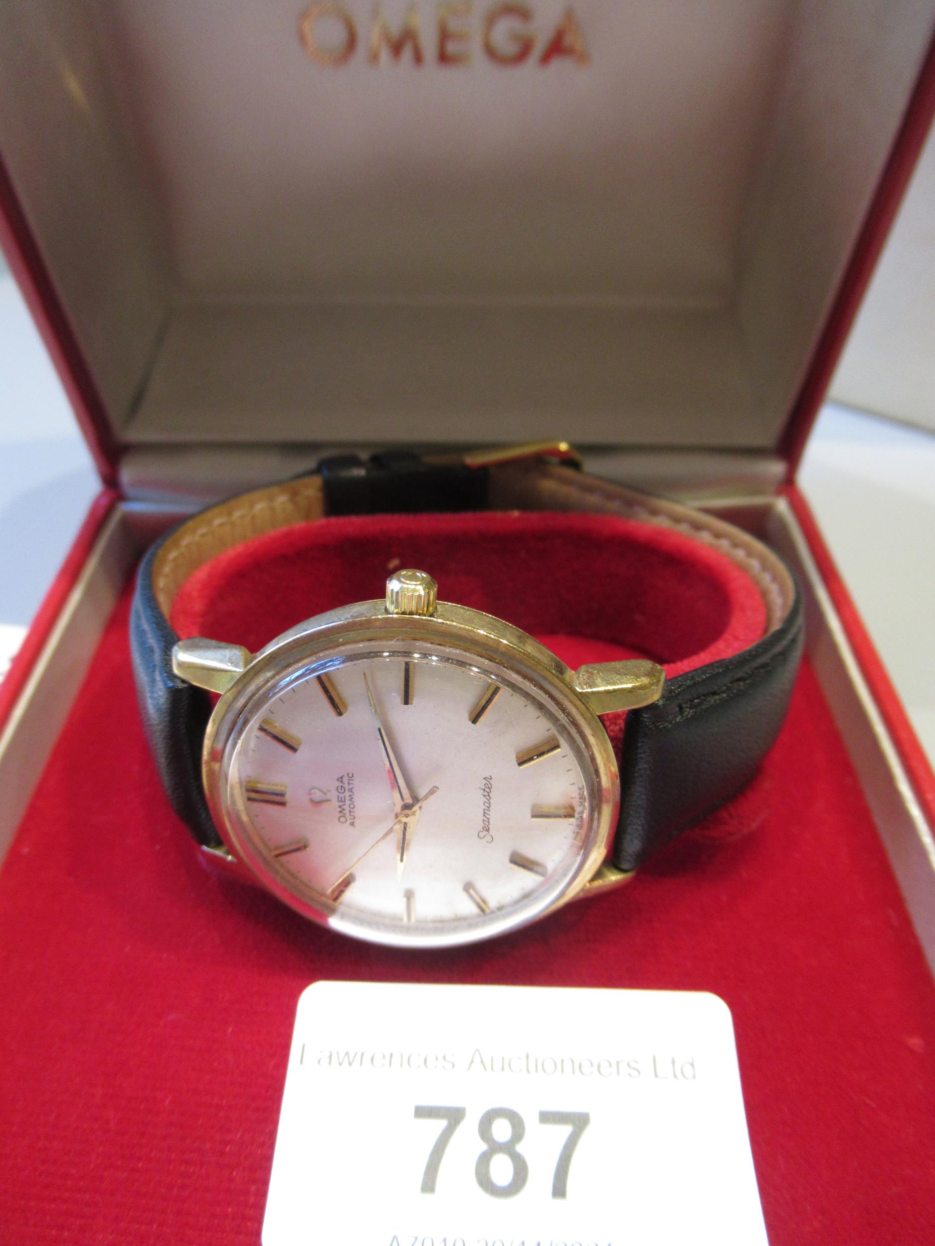 Gentleman's 9ct gold cased Omega Seamaster wristwatch, the champagne dial with baton numerals and