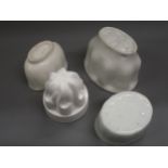 Group of four pottery jelly moulds