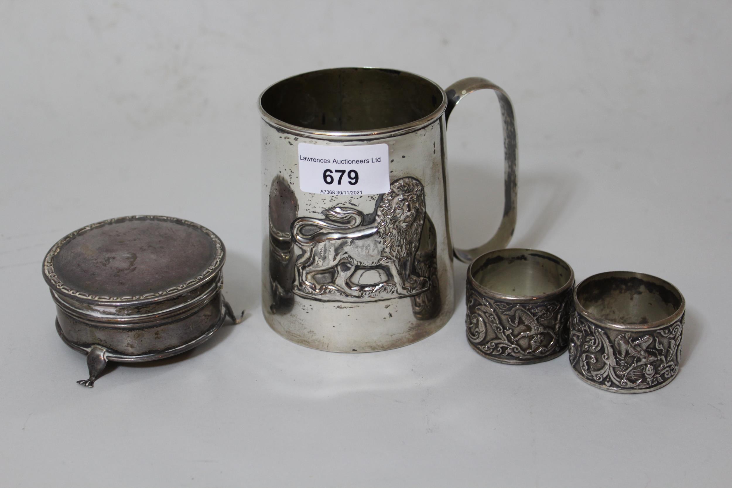 Continental 830 mark, silver mug of tapering form embossed with a figure of a lion, made in Ethiopia