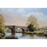 Mike Kerris, oil on canvas, Cornish river landscape with stone bridge, signed, 16ins x 24ins, gilt