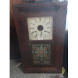 19th Century American rectangular mahogany cased wall clock with a two train weight driven movement,