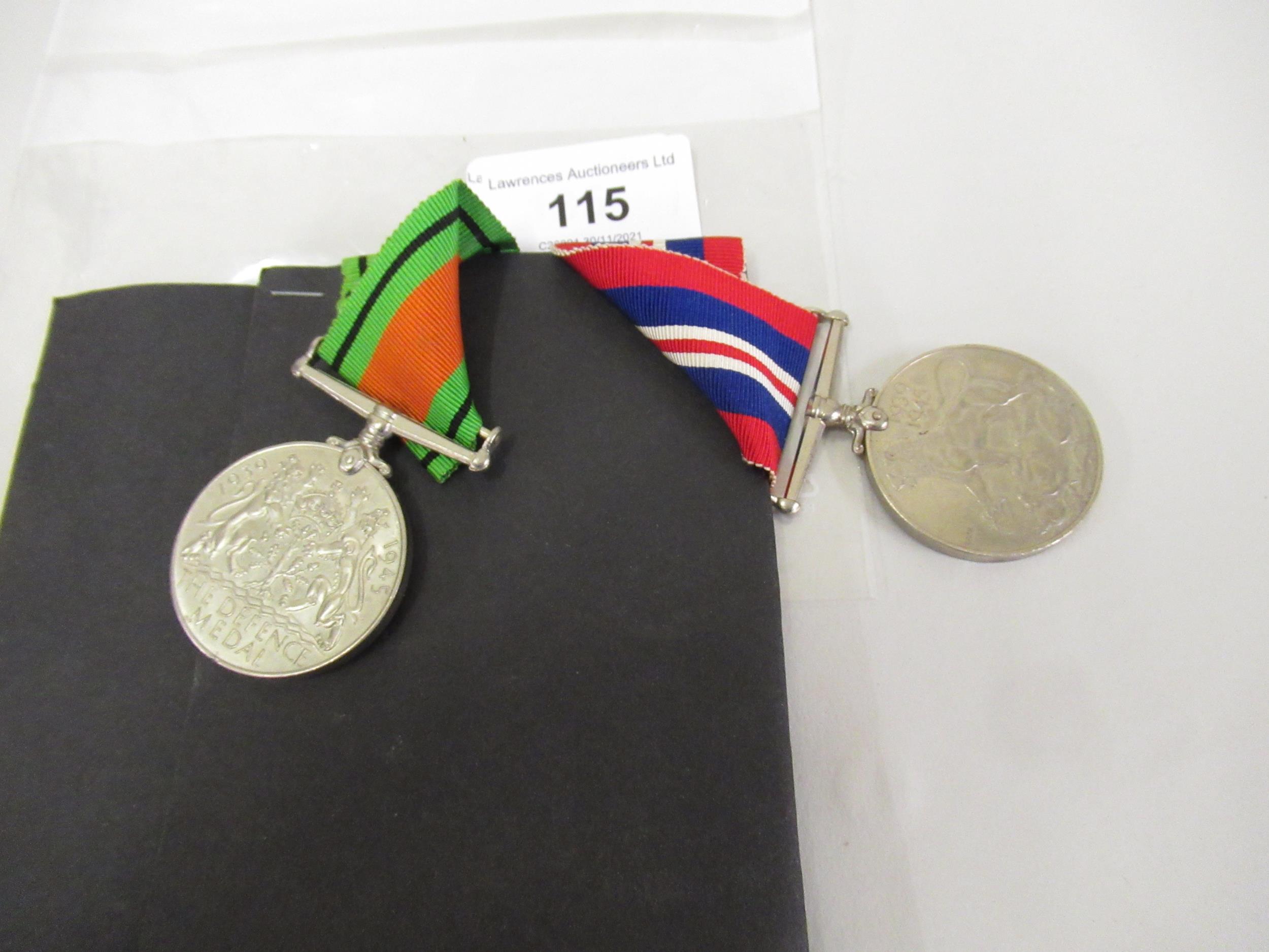 Two World War II medals on ribbons, mounted to a card - Image 2 of 2