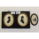 Pair of 20th Century oval mounted miniature silhouette portraits of gentlemen, signed Ray, framed,