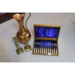 Oak cased six place set of fish knives and forks, pair of brass candlesticks and a copper jug
