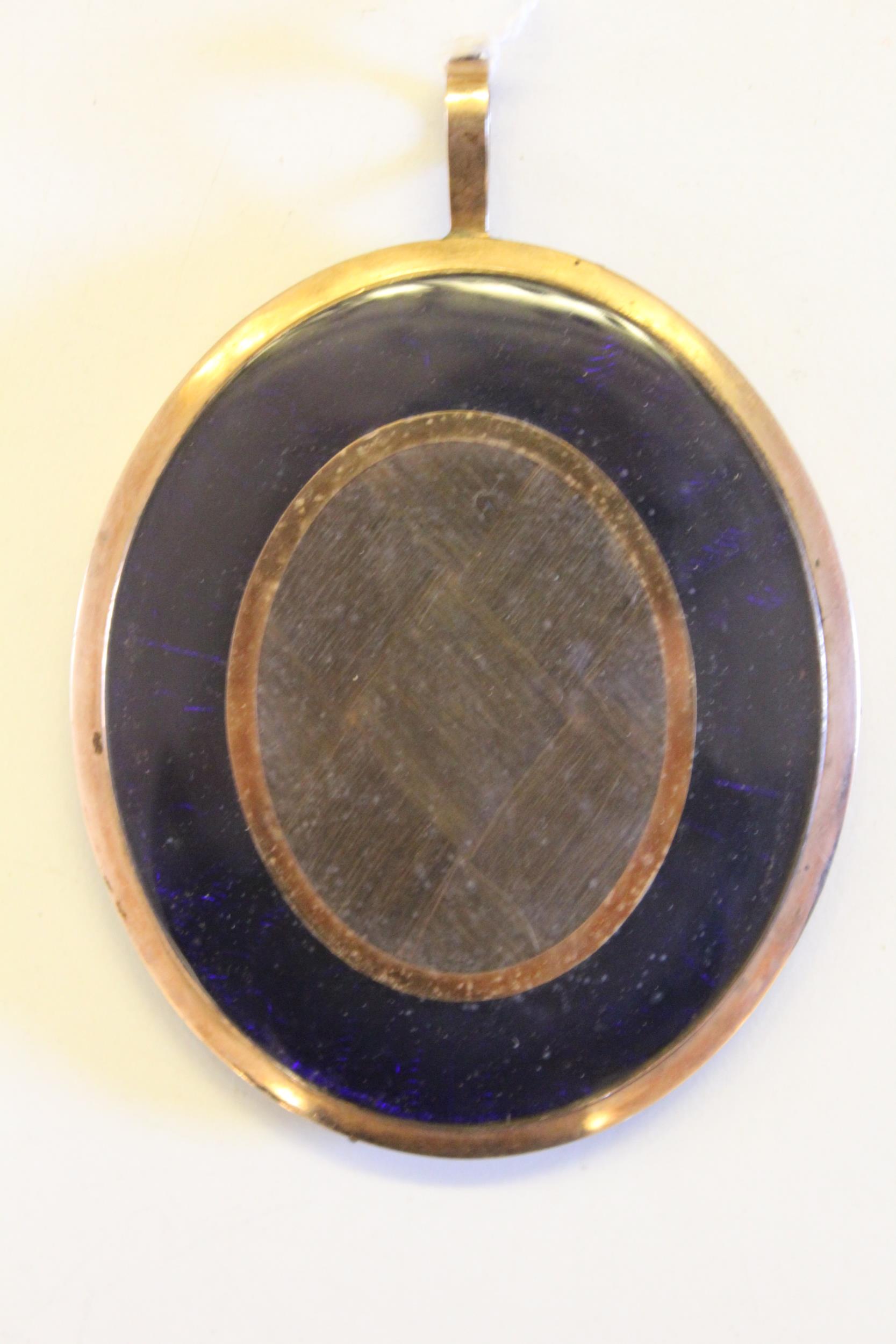 Circle of Thomas Hazlehurst, watercolour portrait miniature of a man wearing a blue coat with gold - Image 2 of 2