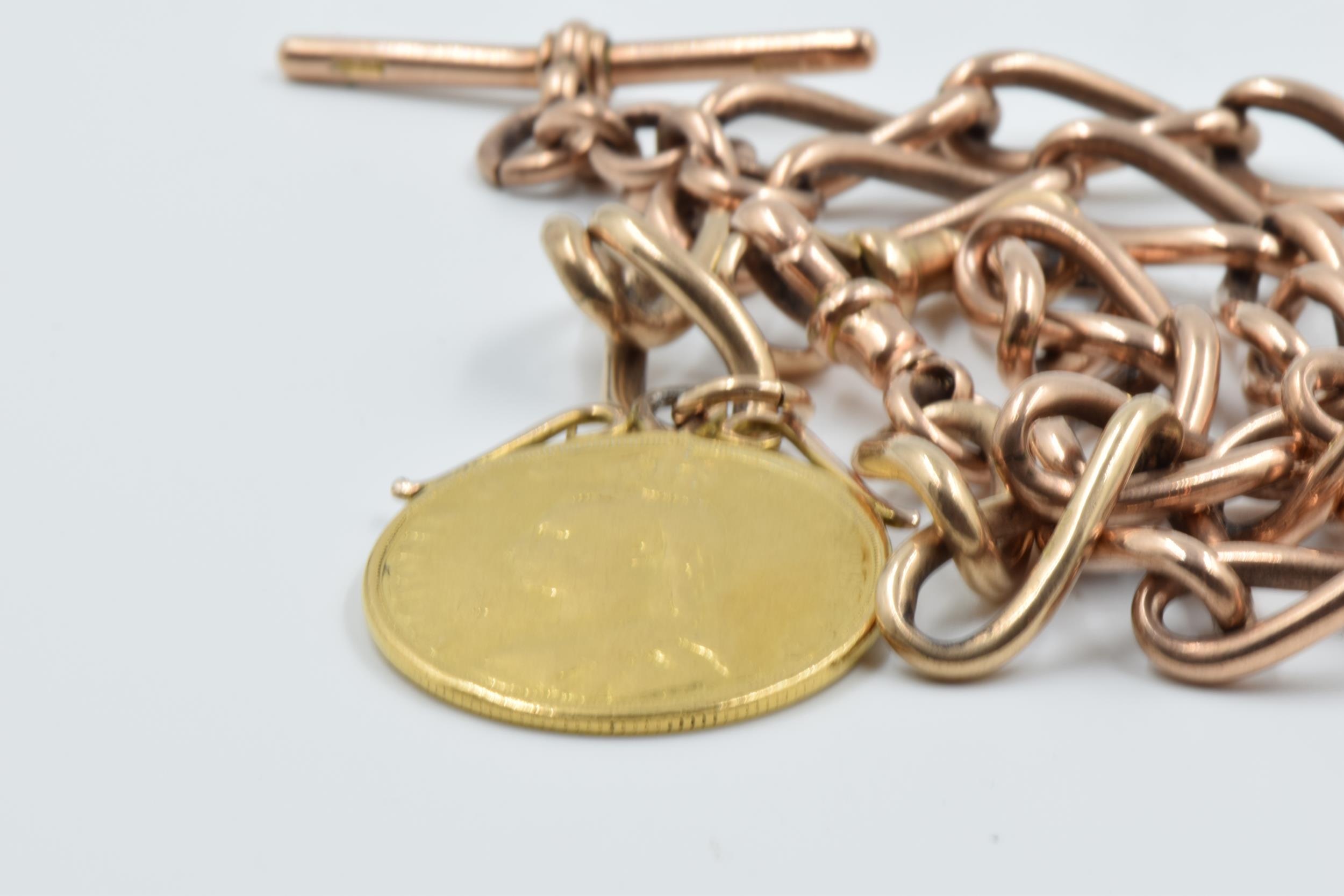 Victorian 1887 two pound gold coin mounted as a pendant, suspended from a heavy 9ct gold Albert