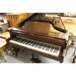 Mahogany cased baby grand piano by George Russell, London, Serial No. 1451, raised on twin square