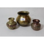 North African turned brass bowl, together with a small floral embossed copper bowl and a small