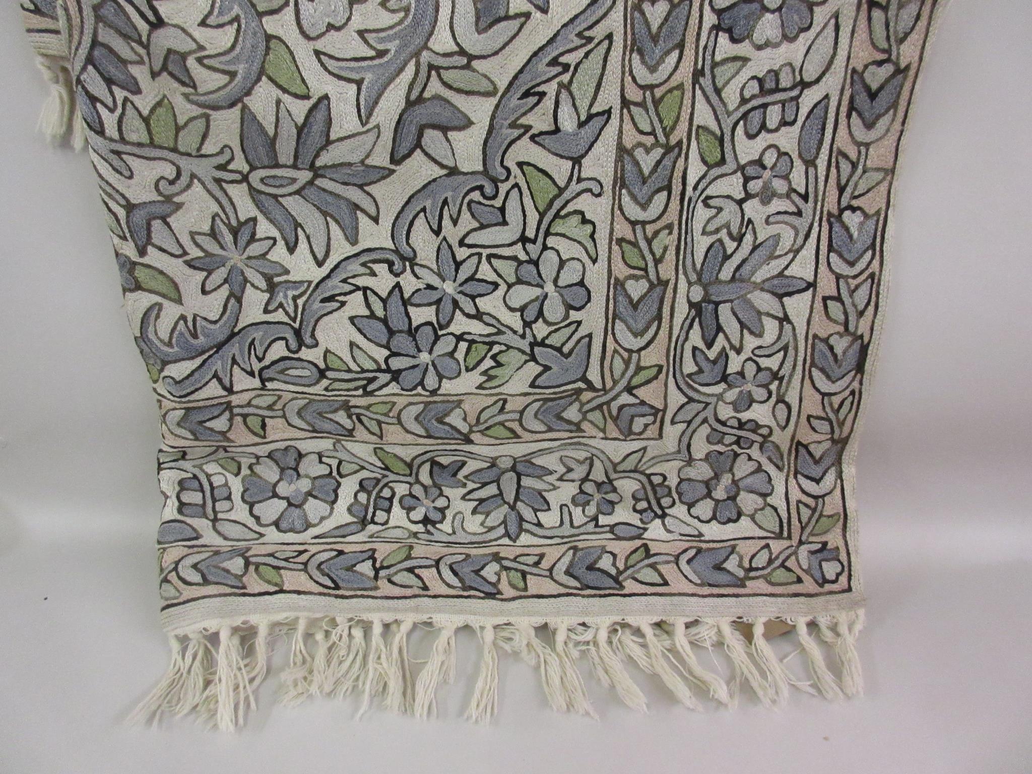 20th Century crewel work wall hanging of all-over floral design with borders, 57ins x 34ins