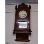 Late 19th Century figured walnut and parquetry inlaid wall clock, the pierced surmount above a