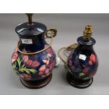 Modern Moorcroft baluster form table lamp decorated in the Peony design on a blue ground, 9.5ins