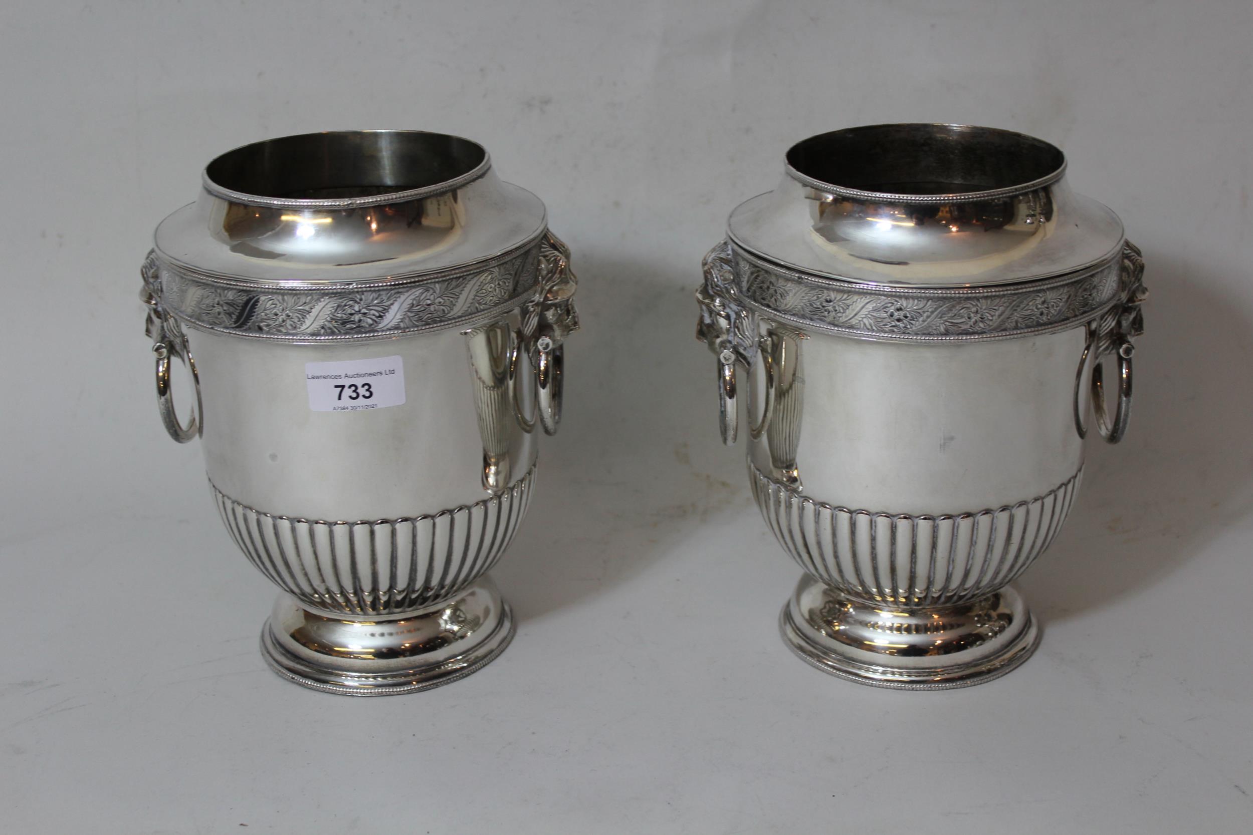 Pair of 19th Century silver plated wine coolers, with lion mask side handles, 8.5ins high