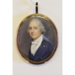 Circle of Thomas Hazlehurst, watercolour portrait miniature of a man wearing a blue coat with gold