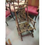 Child's late 19th Century American spindle turned wooden rocking chair