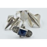 Georg Jensen two Sterling silver rings of stylised form, marked No. 124 and No. 127, together with