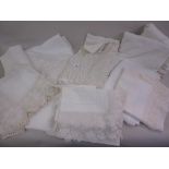 Quantity of various crochet and embroidered table cloths