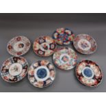 Eight various 19th Century Imari plates, 8ins diameter approximately